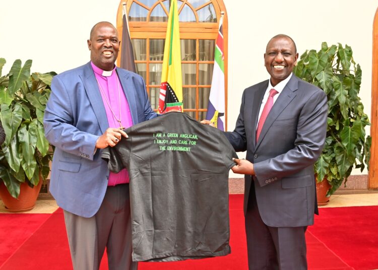 President William Ruto (right) and ACK Archbishop Jackson Ole Sapit pose for a photo after a meeting in March 2023 at State House. 