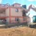 An excavator demolishes a house in Mavoko, Machakos County.