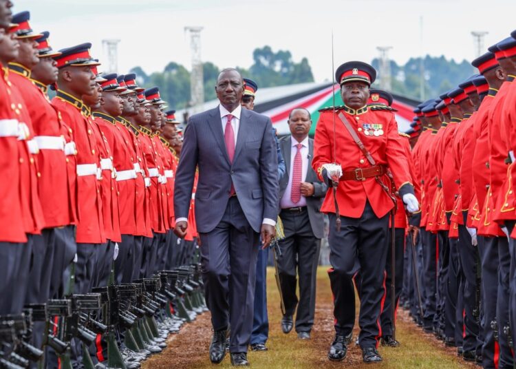 President William Ruto inspects a guard of honor during the Mashujaa Day celebrations. 