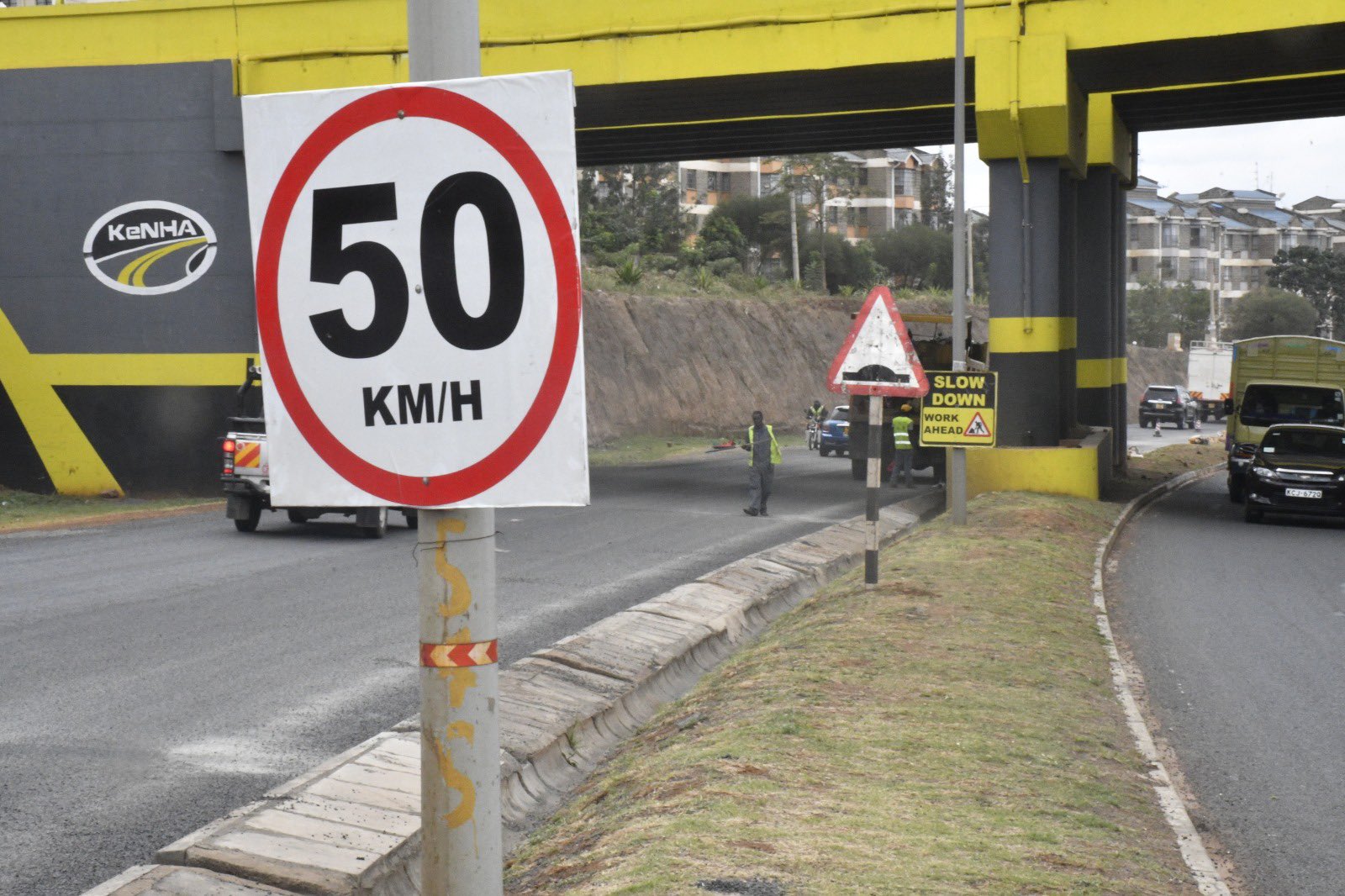 Photo of road signs erected along the southern bypass on ongoing construction works along the road. PHOTO/KeNHA.