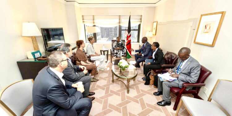 Firsst Lady chairs a meeting with Philip Thigo (on her immediate left) and other stakeholders. 