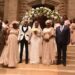 Prime Cabinet Secretary Musalia Mudavadi (right) and his spouse Tessie Mudavadi (next to him) pose for a photo during their daughter's wedding on October 28, 2023 in Nairobi.
