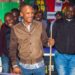 Embakasi East MP Babu Owino playing pool table game with residents.
