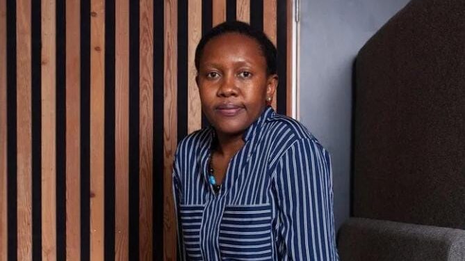 A photo of Doseline Kiguru- a Kenyan lecturer working in the UK.