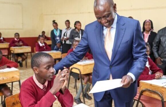 President William Ruto delivers KCPE exam papers. PHOTO/PCS.