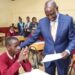 President William Ruto delivers KCPE exam papers. PHOTO/PCS.