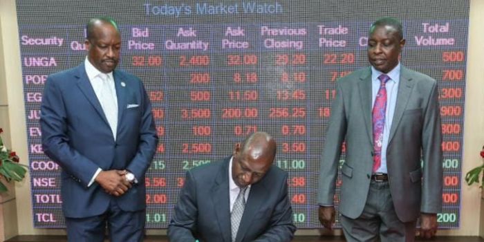President William Ruto (center) at the Nairobi Stock Exchange during a past visit.