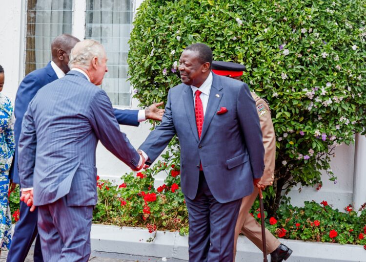 Prime CS and Foreign Affairs CS Musalia Mudavai shakes hands with King Charles III at State House Nairobi on Tuesday, October 31. 