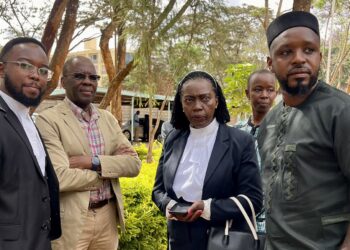 Activist Boniface Mwangi (right) arrives at the Machakos High Court on November 1, 2023. Accompanying him are Martha Karua and a other activists.