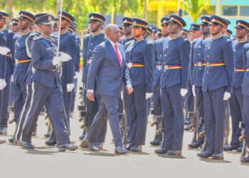 President William Ruto inspects a guard of honour mounted by police officers during a past pass out ceremony.