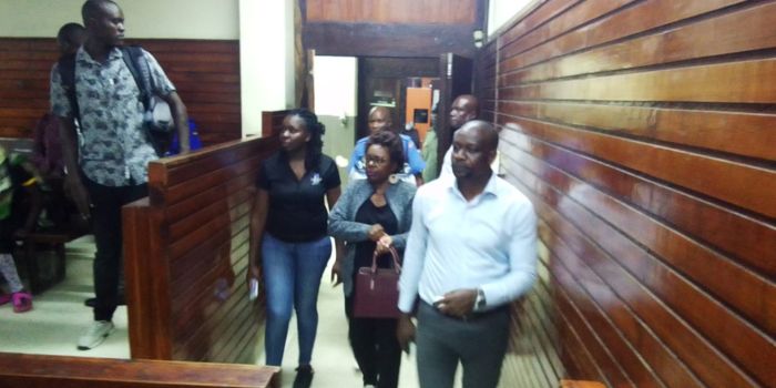 Controller of Budget Margaret Nyakang'o (center) walks into a court on December 5, 2023. 