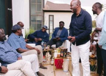 Saboti MP Caleb Amisi (standing) when he hosted Azimio leaders at his home in 2023.