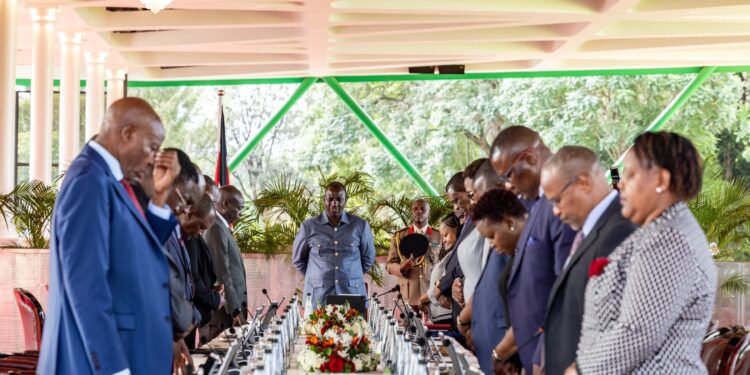 President WWilliam Ruto (center0 leads cabinet secretaries for a word of prayer during a sitting held on February 14, 2024.