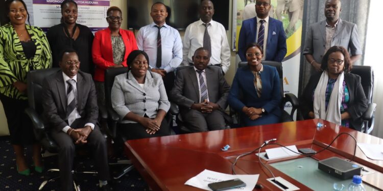Members of the KNQA Senior Management team pose for a group photo alongside officials from the State Department of TVET during a meeting on Assessment of Compliance and Non-Compliance by Regulatory Authorities , PHOTO/Courtesy