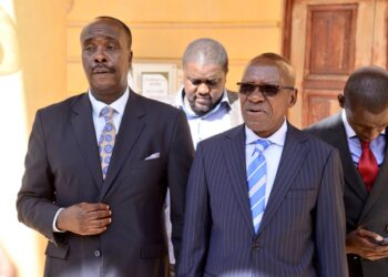 Kakamega Senator Boni Khalwale with his advocate Danstan Omari outside Milimani Law Courts. PHOTO/Khalwale X.