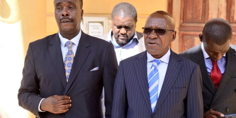 Kakamega Senator Boni Khalwale with his advocate Danstan Omari outside Milimani Law Courts. PHOTO/Khalwale X.