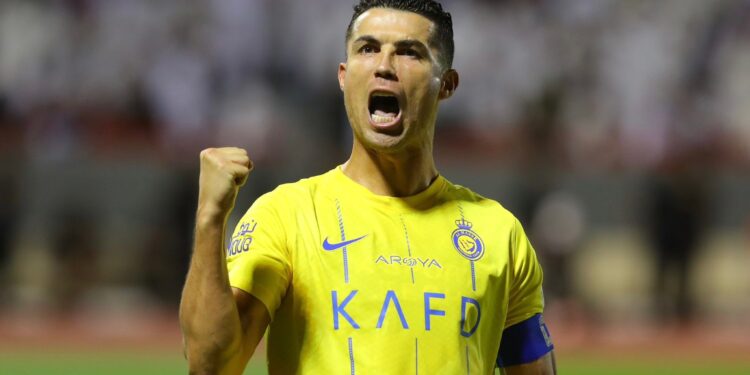 A photo of Cristiano Ronaldo celebrating a win.