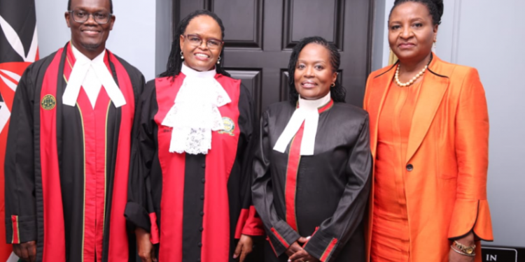 Winfridah Mokaya Boyani poses for a photo with retired Chief registrar Anne Amadi, CJ Martha Koome and Paul Ndemo. PHOTO/ Judiciary Kenya