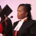 Chief Registrar of the Judiciary Winfridah Mokaya takes the oath of office during her swearing-in at the Supreme Court in Nairobi on March 25, 2024. | PHOTO: Judiciary