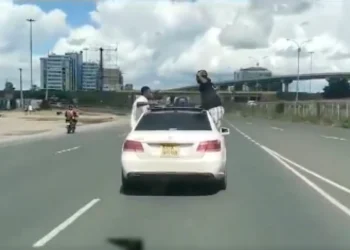Youth Arrested After Being filmed hanging From Moving Car