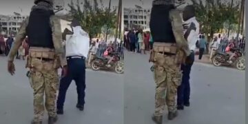 A collage of screengrabs showing KDF soldier assaulting a security guard.