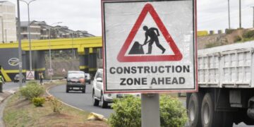Photo of construction warning road sign