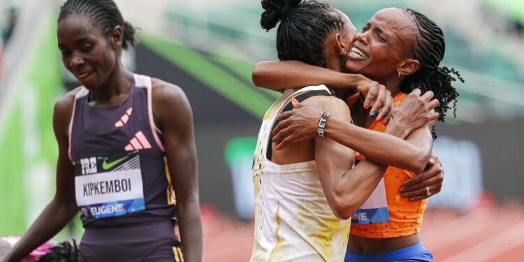 Beatrice Chebet celebrates after setting a world record in the 10,000 with a time of 28:54.14, during the Prefontaine Classic track and field meet Saturday, May 25, 2024, in Eugene, Ore. PHOTO/ AP