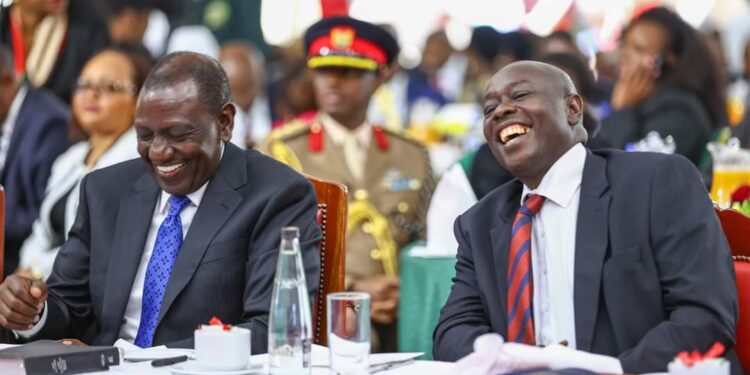 President William Tuto and Dp Rigathi Gachagua share a light moment during the National Prayer Breakfast. PHOTO/PCS