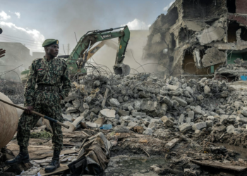 A building under demolition in the Mathare informal settlement of Nairobi, Kenya. Photo by LUIS TATO/AFP via Getty Images