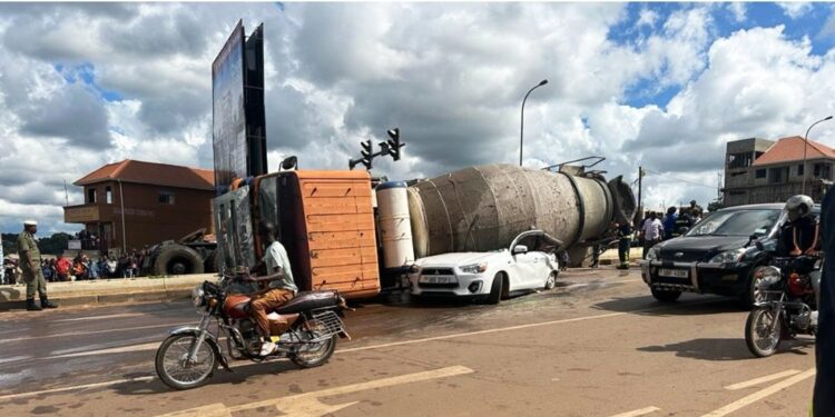 Accident Alert: Concrete Truck Overturns on Vehicle