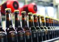Beer bottles on an assembly line. PHOTO/Courtesy