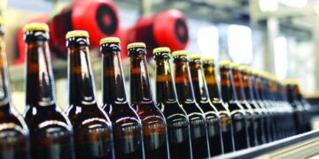 Beer bottles on an assembly line. PHOTO/Courtesy