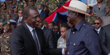 ODM Leader Raila Odinga (right) and President Ruto shake hands during the memeorial service held in honour of Late General Francis Ogolla.