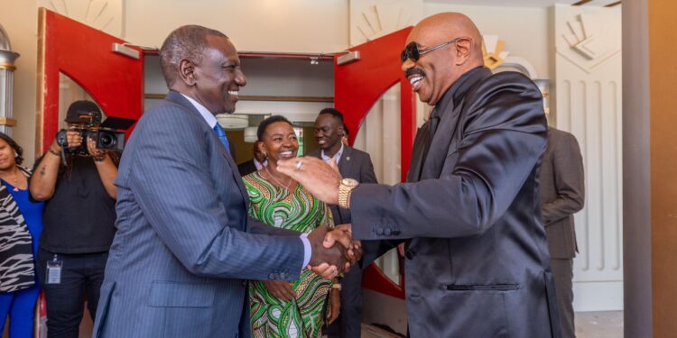 President William Ruto (left) and Steve Harvey at the Tyler Perry Studios. 