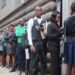 past photo of candidates lining up for a job interview. photo/NMG