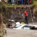 The body of Chief Inspector Cyprian Walunya Kasil being retrieved from River Kware. PHOTO/Screengrab