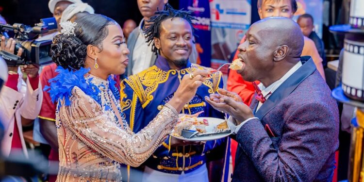 Diana B serves cake to Deputy President Rigathi Gachagua at the launch of The Bahati Empire show on June 7, 2024. PHOTO/Bahati