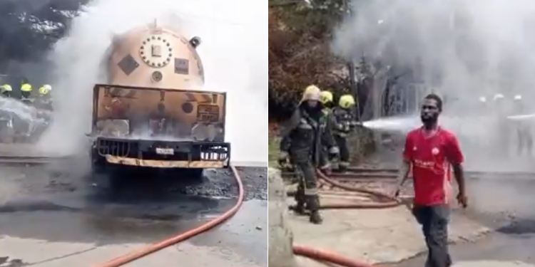 Firefighters extinguishing fire after a gas tanker burst into flames in Embakasi area of Nairobi. Photo/UGC