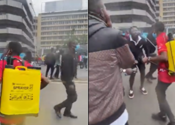 A protestor using Knapsack sprayer to help teargassed protesters in Nairobi CBD. Photo/TKT