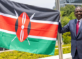 President Ruto holding Kenya's flag. Photo\Courtesy