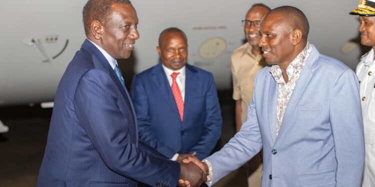 Kimani Ichung'wah receiving President Ruto during his return from Rwanda. Photo/Ichung'wah