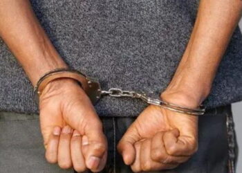 Suspect in handcuffs