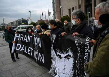 AFP - Demonstrators held banners reading "For Hrant, For Justice" in front of the Istanbul court