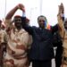 AFP | Chad's President Idriss Deby Itno (C) holds hands with Chadian army chiefs and his son Mahamat Idriss Deby (R) in N'Djamena in 2013