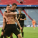 Robert Lewandowski celebrates scoring his 41st Bundesliga goal this season | AFP