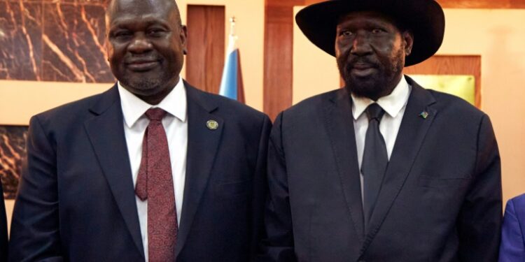 South Sudanese President Salva Kiir (R) dissolved parliament as part of a 2018 accord signed with ex-rival, Vice President Riek Machar (L) | AFP