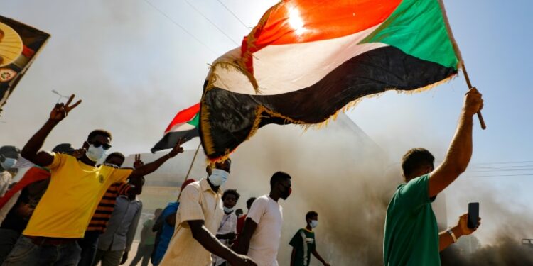 Macron praised the 2019 Sudan revolution that ousted strongman Omar al-Bashir | AFP