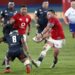 British and Irish Lions prop Rory Sutherland (R) passes the ball during a tour match against the Sharks in Johannesburg on July 7 | AFP