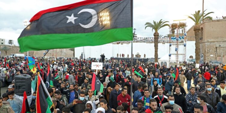 Libyans celebrate in the capital Tripoli the 11th anniversary of the uprising that ousted dictator Moamer Kadhafi amid political tensions in the North African country | AFP