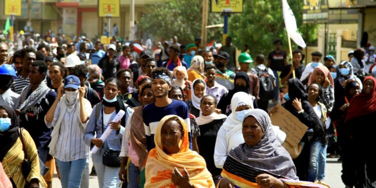 Sudanese protesters take part in ongoing demonstrations calling for civilian rule, in Sudan's capital Khartoum on March 14, 2022 | AFP
